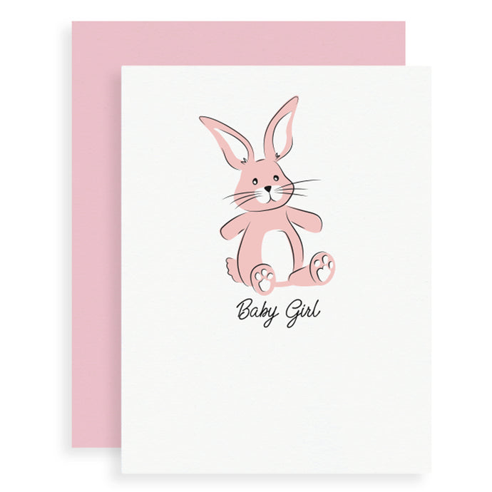 Baby Girl Bunny card featuring a hand drawing of a toy stuffed bunny screen printed in pink and black inks.