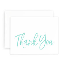 Hand lettered thank you card in large pale blue type on white paper with matching white envelope.