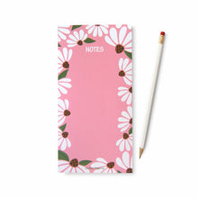 Notes pad with white coneflowers on pink background.