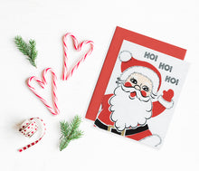 Santa character Ho Ho Ho holiday greeting card.