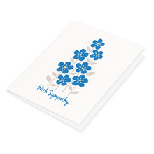 With Sympathy blue flower card.