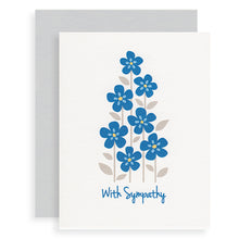 With Sympathy blue flower card.